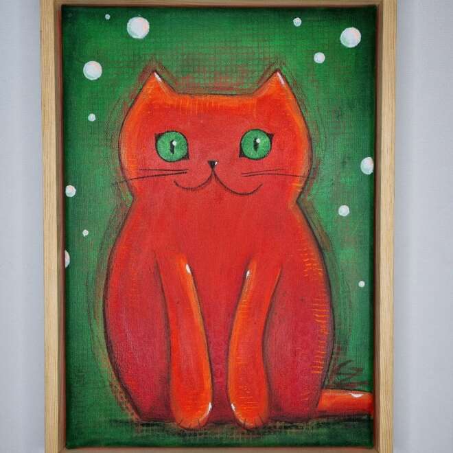 (Neon)Orange Miezekatze auf Grün