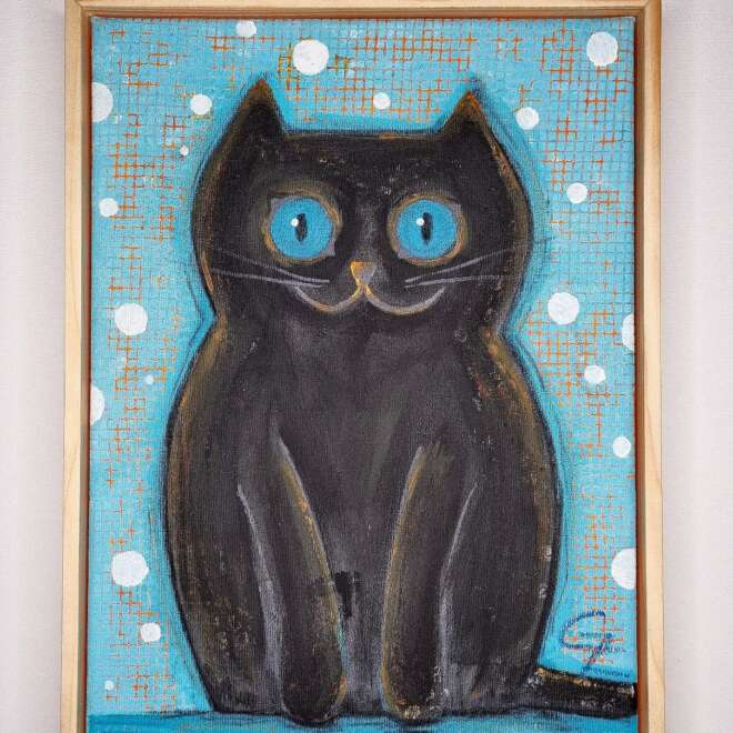 Schwarze Miezekatze auf türkis